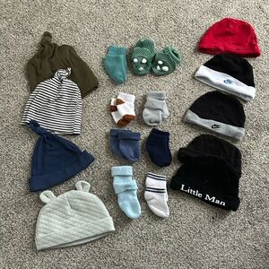 Baby bundle of hat and socks one pair of dinosaur knitted slippers. Nb-3m